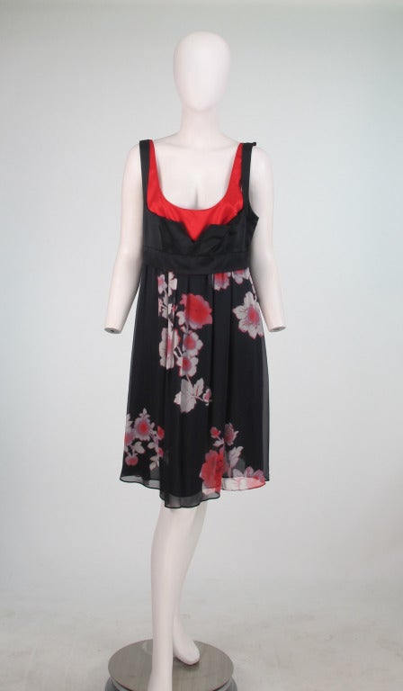 Etro silk floral dress...Gorgeous silk chiffon print dress...Low scoop neckline, front & back...Silk satin bodice in black with separate under bodice in red...Skirt is fully lined...Closes at back with a zipper...New with tags...Marked size