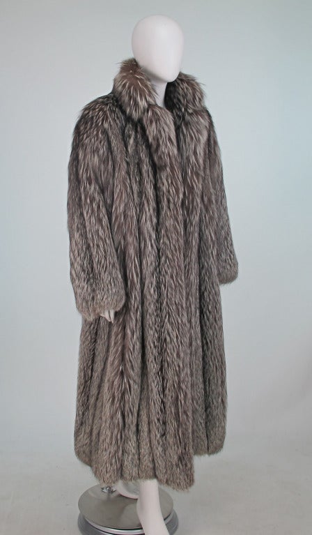 Gorgeous silver fux full length fur coat from the 1990s, looks barely worn & is just out of cold storage...Luxurious long silky fur will keep you warm in the coldest days of winter...Deep collar can be worn open or closed, long full sleeves, on seam