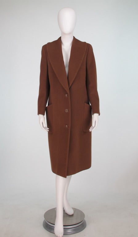 Gianni Versace Couture tobacco colour cashmere coat...Great casual coat with lots of style...Shawl collar, single breasted style, with Medusa head buttons (a little wear to the high points, nose etc)...Center back hem vent, bound button holes, patch