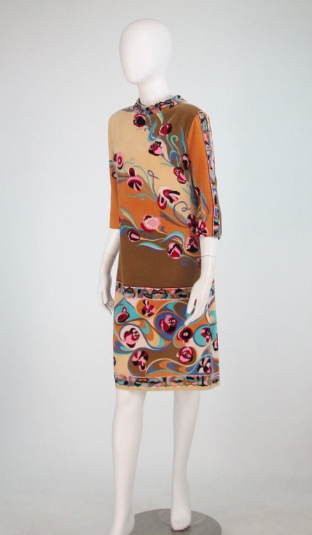 Early 1960s Pucci velvet mini dress in soft apricots, peach & muted gold/fawn with Pucci's vibrant colourfully patterned banded swirls...A line dress has a stand up collar, elbow length sleeves...Closes at the back with a placket, hidden zipper and