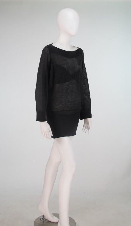 Azzedine Alaïa  1980s dark heather brown open knit sweater/tunic (mohair/linen/rayon)...Pull on style with boat neck, long raglan sleeves...Heavier knit hip band and bra/bow at bodice front...In excellent wearable condition...Marked size