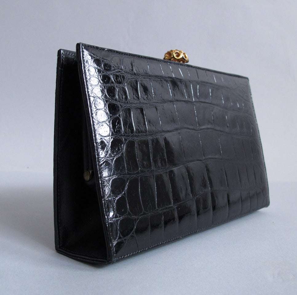 Women's Black crocodile clutch handbag