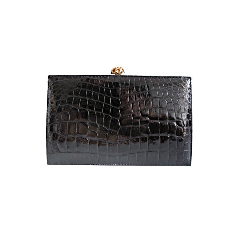 Black crocodile clutch handbag