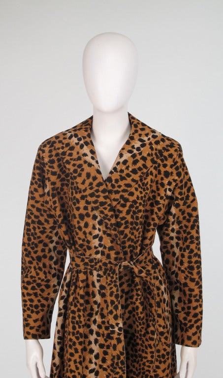 Animal prints are always in style and the wrap trench coat will never loose it's appeal because it's just too easy to throw on add a few accessories and look fabulous...This 1980s Ultra suede cheetah print trench coat is chic and perfect for year