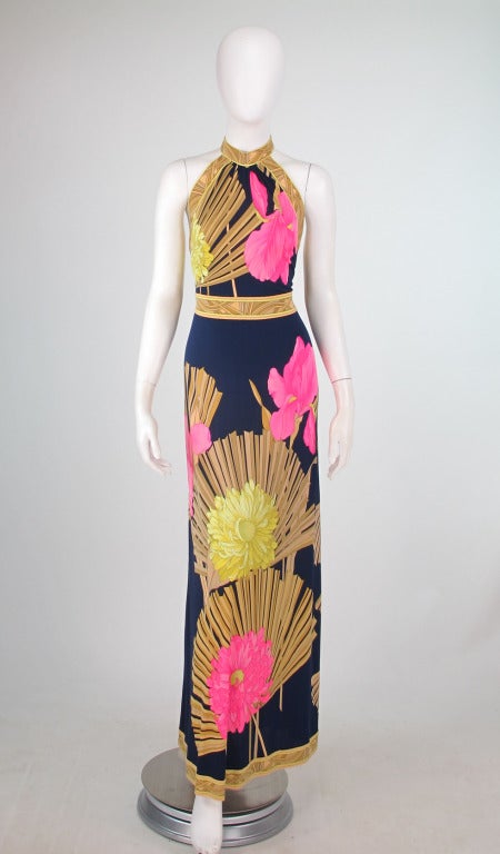 If you are heading for a tropical isle don't leave without this stunning halter neck dress from the 1960s from Leonard, Paris...Sleek fit gown with halter neckline that has attached wide ties at the back, fitted maxi skirt in a narrow A line
