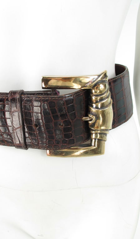 1990s  KIESELSTEIN-CORD wide sterling silver buckle with alligator belt...Huge gold washed sterling silver buckle with an Art Deco feel...Wide genuine alligator belt in dark chocolate brown...Marked size 2...In excellent condition...

Measurements