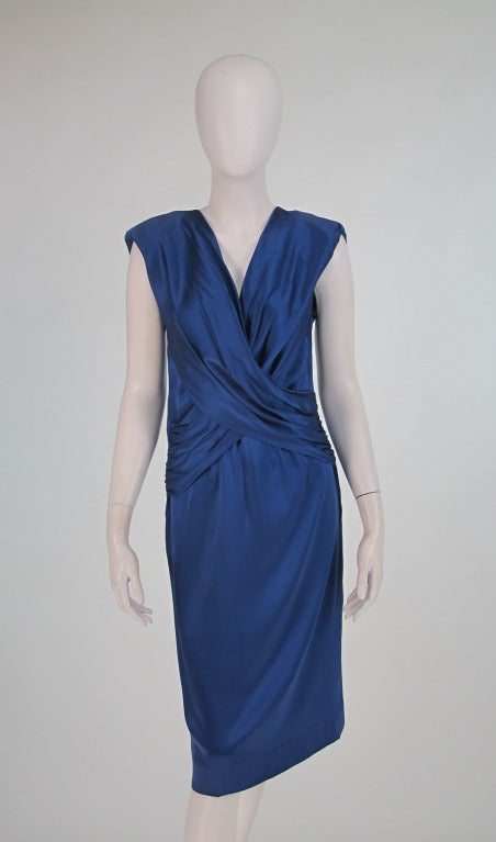 Gorgeous John Anthony cocktail dress in marine blue silk...Chic cut and simplicity of design are what set John Anthony dresses apart, you just know you look fabulous when you put on one of his dresses!  Surplice neckline, light padding in the