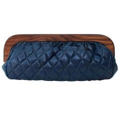 Vintage 1980s large wood frame navy blue quilted leather clutch bag