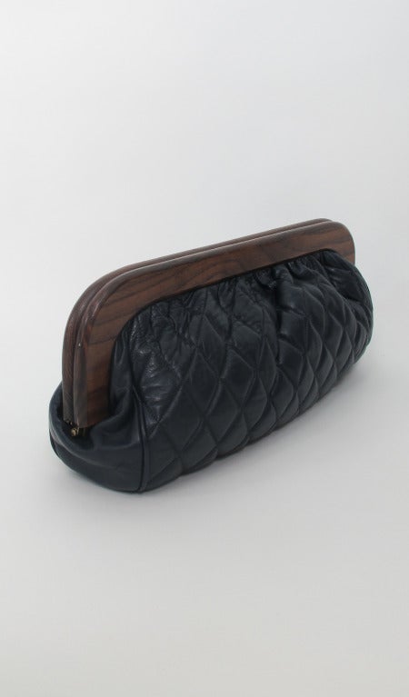 1980s large wood frame navy blue quilted leather clutch bag 3