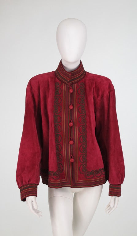 Yves St Laurent Russian collection corded suede jacket...Bohemian feel jacket with black soutache braid and coloured cording at the collar, cuffs and hem...In a gorgeous shade of claret...Looks unworn...Marked size 40 fits like a modern 6-8

In