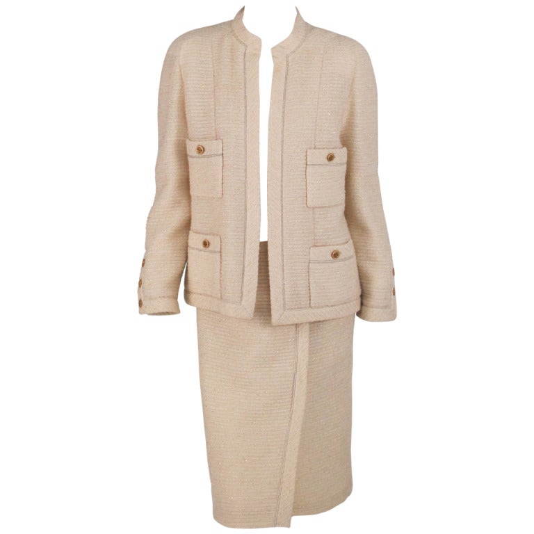 1980s Chanel ivory boucle suit with gold lurex thread