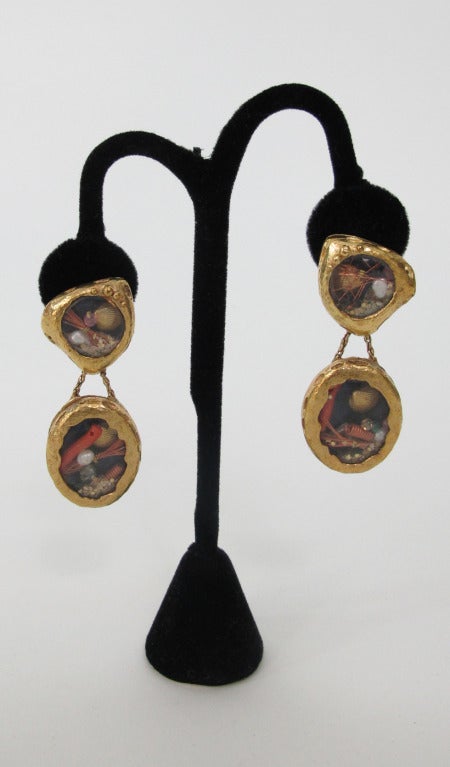 Christian LaCroix bricolage clip back earrings...Each earring has a framed glass 