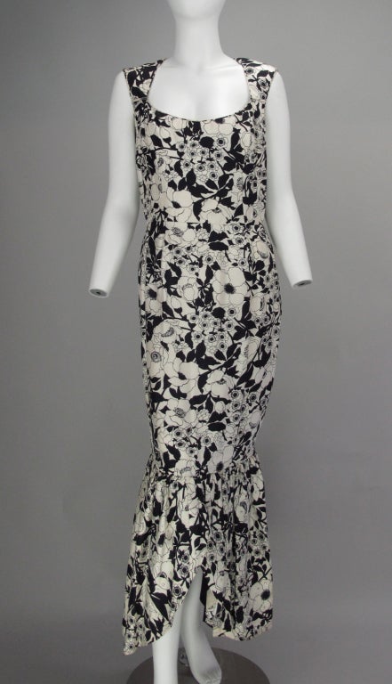 From the early 1960s...a stunning black and white silk print from one of America’s premier taste arbiters…Mr. Blackwell’s biting list of the “Worst dressed” was taken seriously in its day…A sleeveless floral printed gown in black and white…low scoop