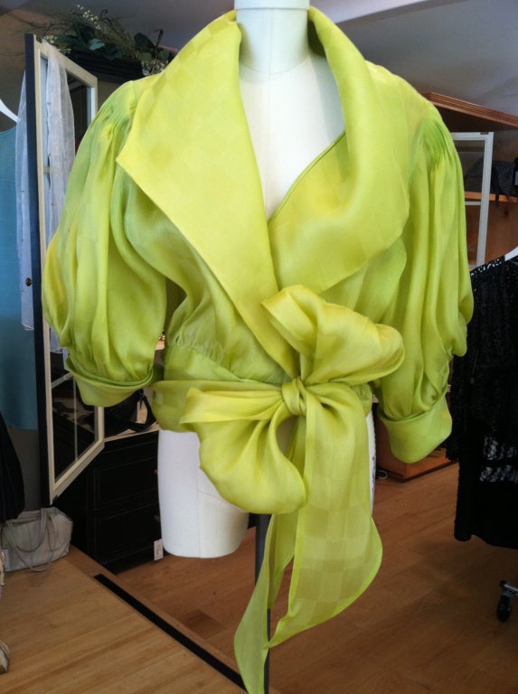 Gorgeous chartreuse green organza blouse with wide collar, puff sleeves, generous sash tie and pleated detail on sleeves.