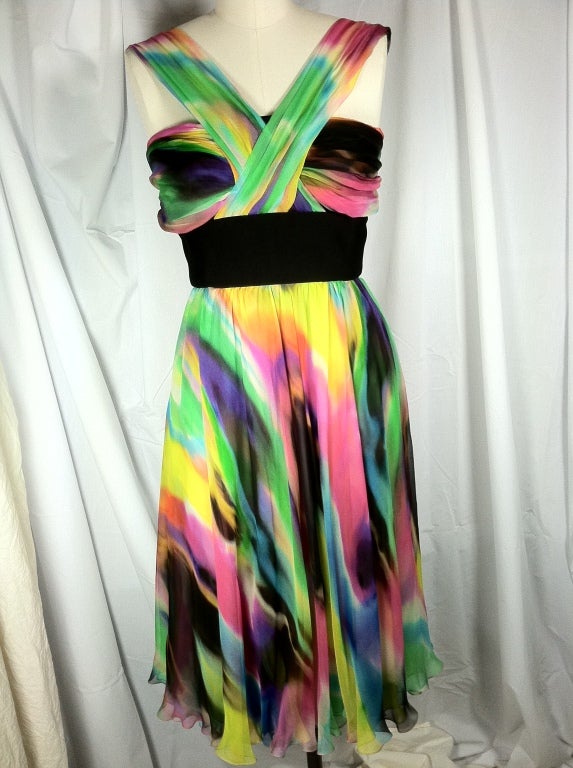 Soft rainbow silk dress with crisscross bust and unique back strapping.  Exposed contrasting metal back zip.  Full slip lining.<br />
<br />
Please note that all sales are final. No returns or exchanges. Please call us with any questions or for