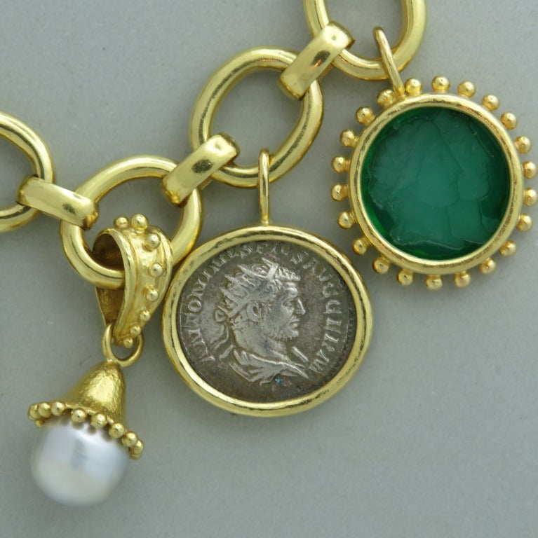 18k Yellow Gold ,  include an ancient Roman coin, an antique Chinese mother of pearl gambling token, ,  pearls and colorful Venetian intaglios all set in 18 karat - will fit up to a 7 1/2 inch wrist- Signed twice with Elizabeth Locke's monogram and