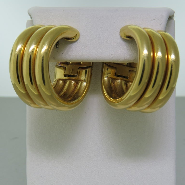 18k yellow gold, 32mm in diameter, 15mm wide. weight 59.2g. Marked:@ Marina B, 1987, MB A372, 750, Italy. hinged closure for non pierced ears