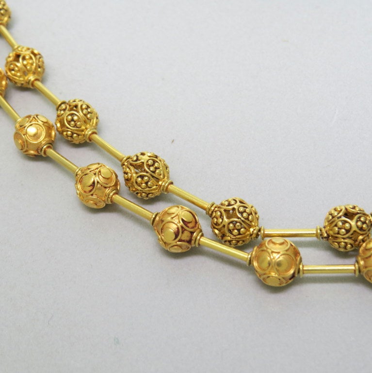 Two Etruscan revival bead necklaces of high carat yellow gold. Measurements - 18