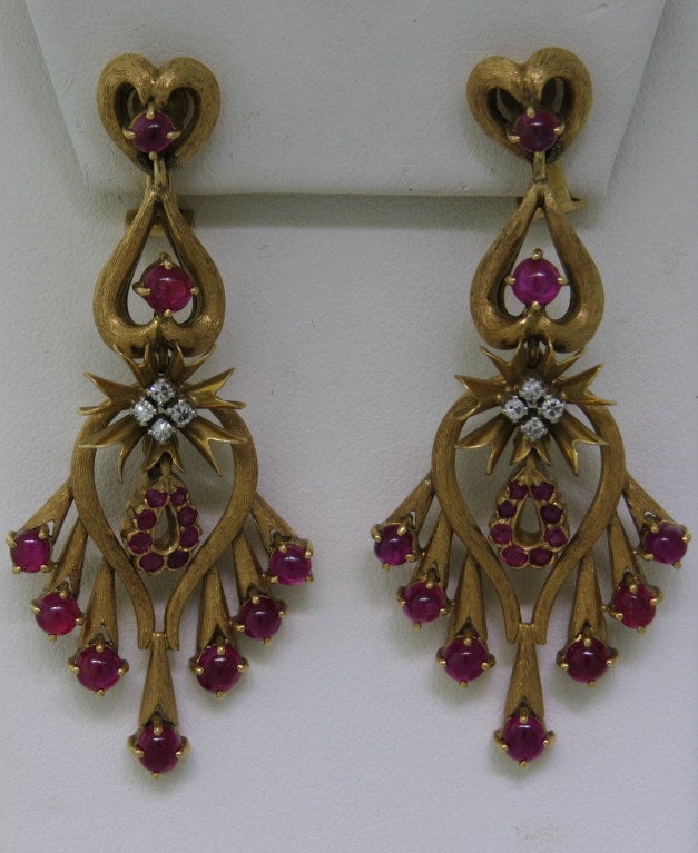 Circa 1960s vintage 14k yellow gold chandelier cocktail earrings. Rubies - approx. 3.80-4.00ctw, diamonds - approx. 0.16ctw G/VS. Measurements - 56mm x 27mm.Weight - 26.3g