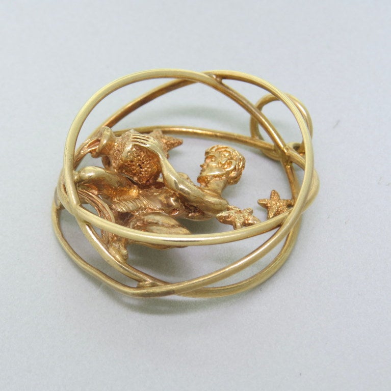 Ruser 14k yellow gold Aquarius pendant. Pendant is 38mm in diameter.,bale is 11.3mm in diameter. Marked - Copyright,Ruser,14k. weight - 27.5g