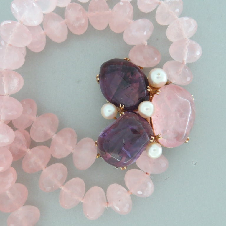 Faceted rose quartz beads, massive clasp decorated with amethyst and cultured salt water pearls. shorter strand 17