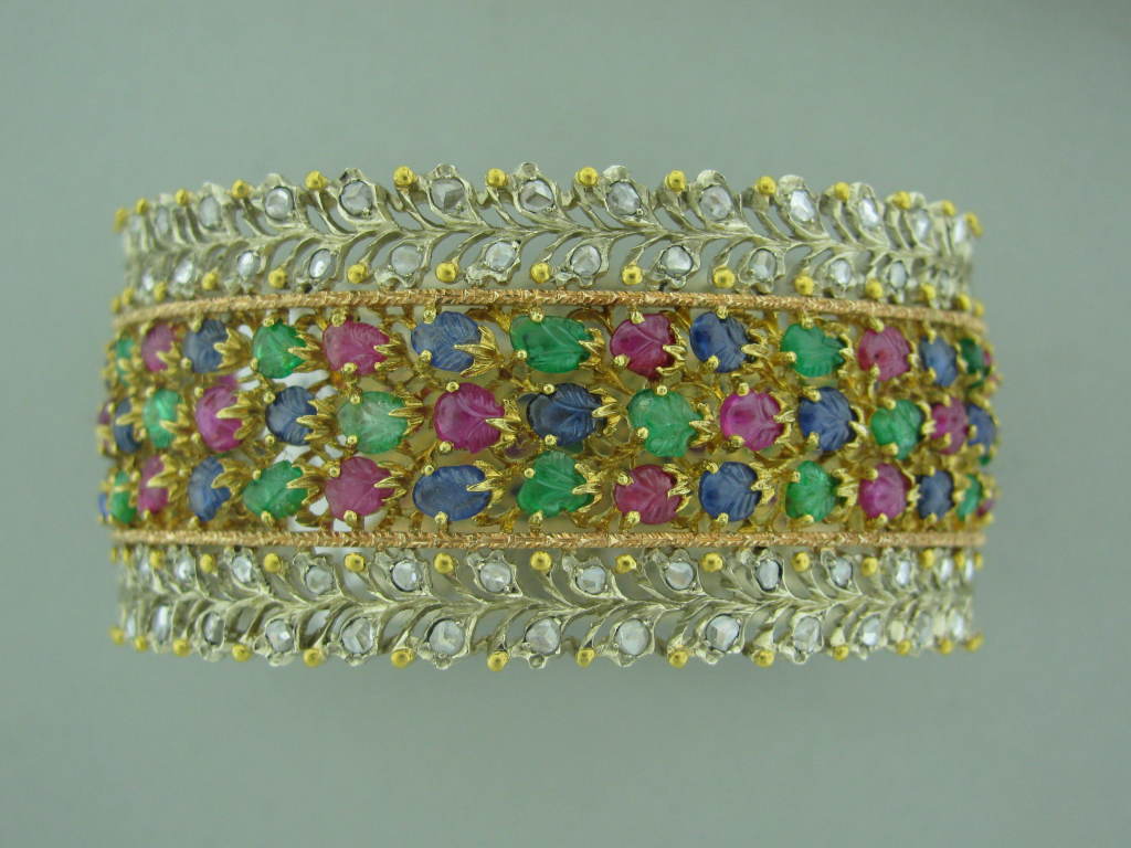 Metal: 18K Yellow Gold Marked/tested: Buccellati, Italy, 750 Gemstones/diamonds: Rubies Sapphires Emeralds Rose Cut Diamonds Clarity:n/a Color:n/a Measurements: Bracelet Comfortably Fits Up To 6.5
