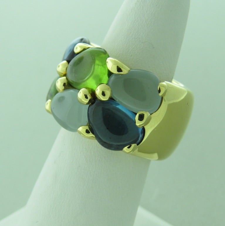 New Pomellato 18k gold aquamarine topaz peridot ring from Sassi collection. Ring size 6, ring is 15.5mm wide. weight - 25.6gr
