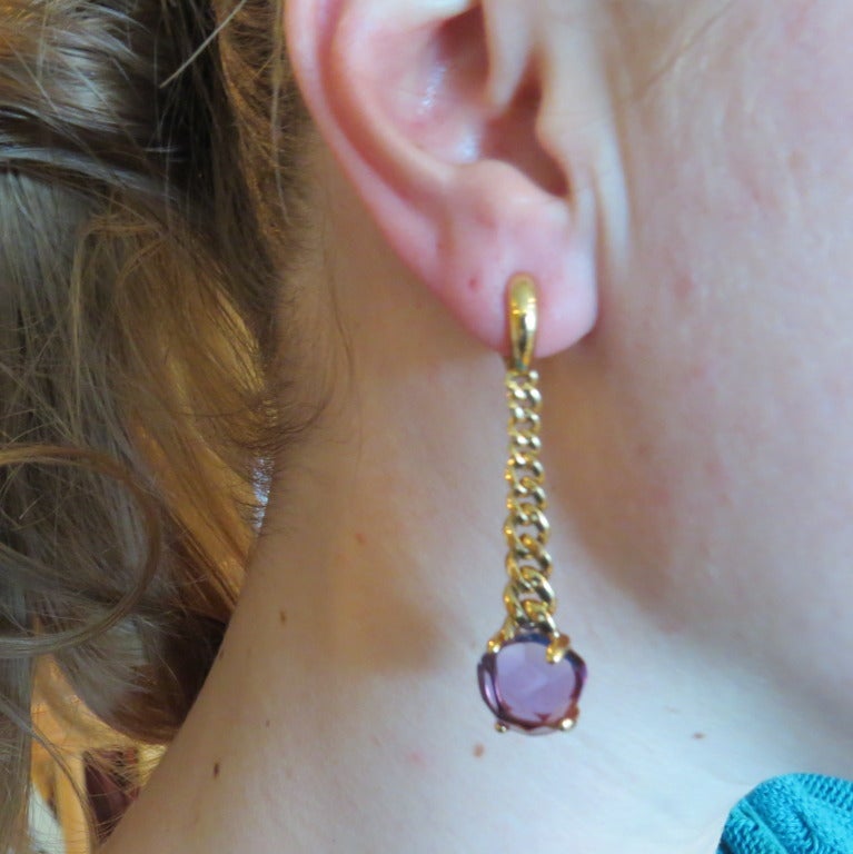 New Pomellato 18k gold amethyst earrings from Lola collection,retail for $6990. earrings are 56mm long. weight - 19.1gr