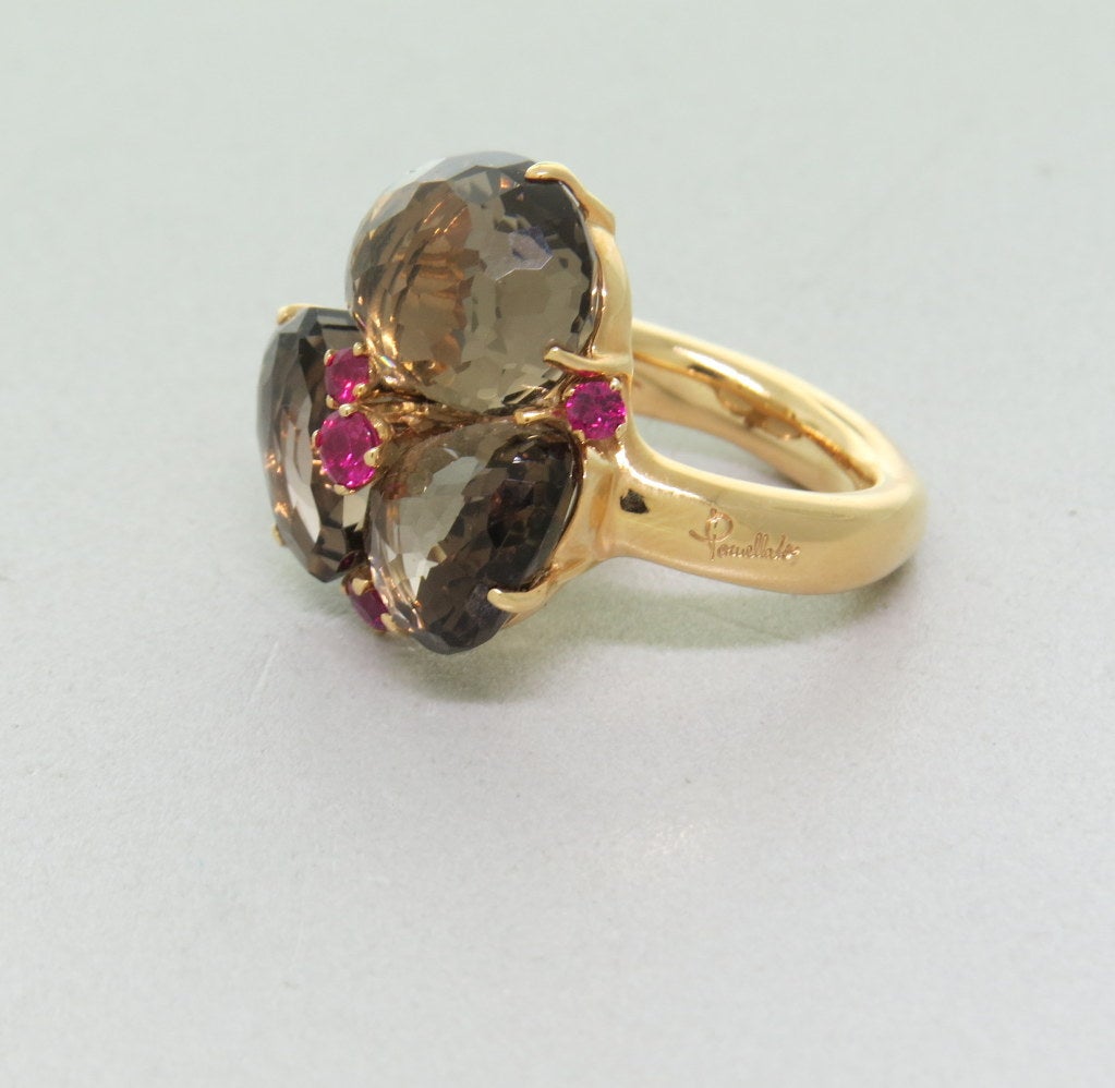 New Pomellato 18k rose gold ring with smokey quartz and rubies. Ring size 7, ring top is 25mm x 24mm. weight - 20.0gr