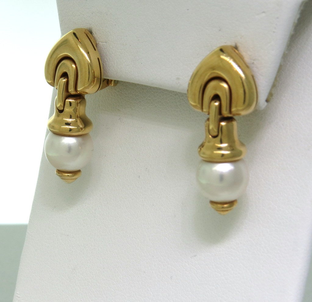 Bulgari 18k gold drop earrings with 9.4mm pearl. Earrings are 28mm x 12mm. Marked - Bulgari,made in Italy,750. Come in Bulgari box. weight - 20.2gr