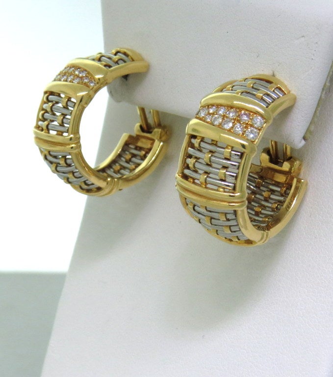 Cartier 18k gold hoop earrings with approx. 0.46ctw diamonds. Marked - Cartier,750,acier. Hoops are 24mm in diameter and 12mm wide. Weight - 19.9gr