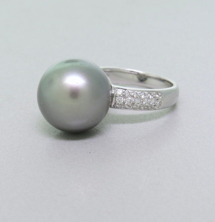 18k white gold, tahitian gray pearl 13.8mm in diameter , diamonds approx. 0.20ctw G/VS. weight 8.4g, finger size -6