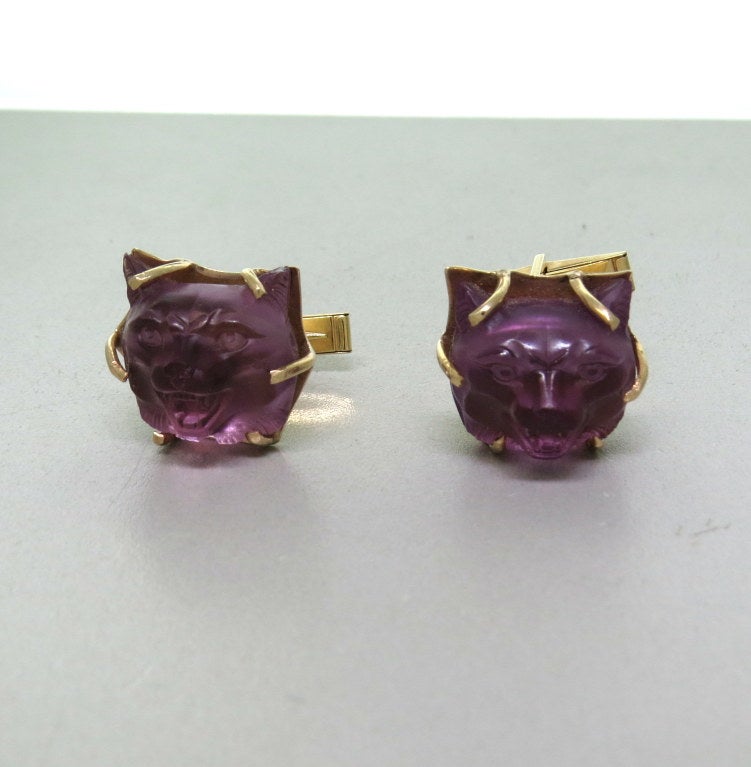 14k yellow gold cufflinks with carved amethyst featuring wolf head. Cufflink top - 20mm x 17mm. weight - 18.8g