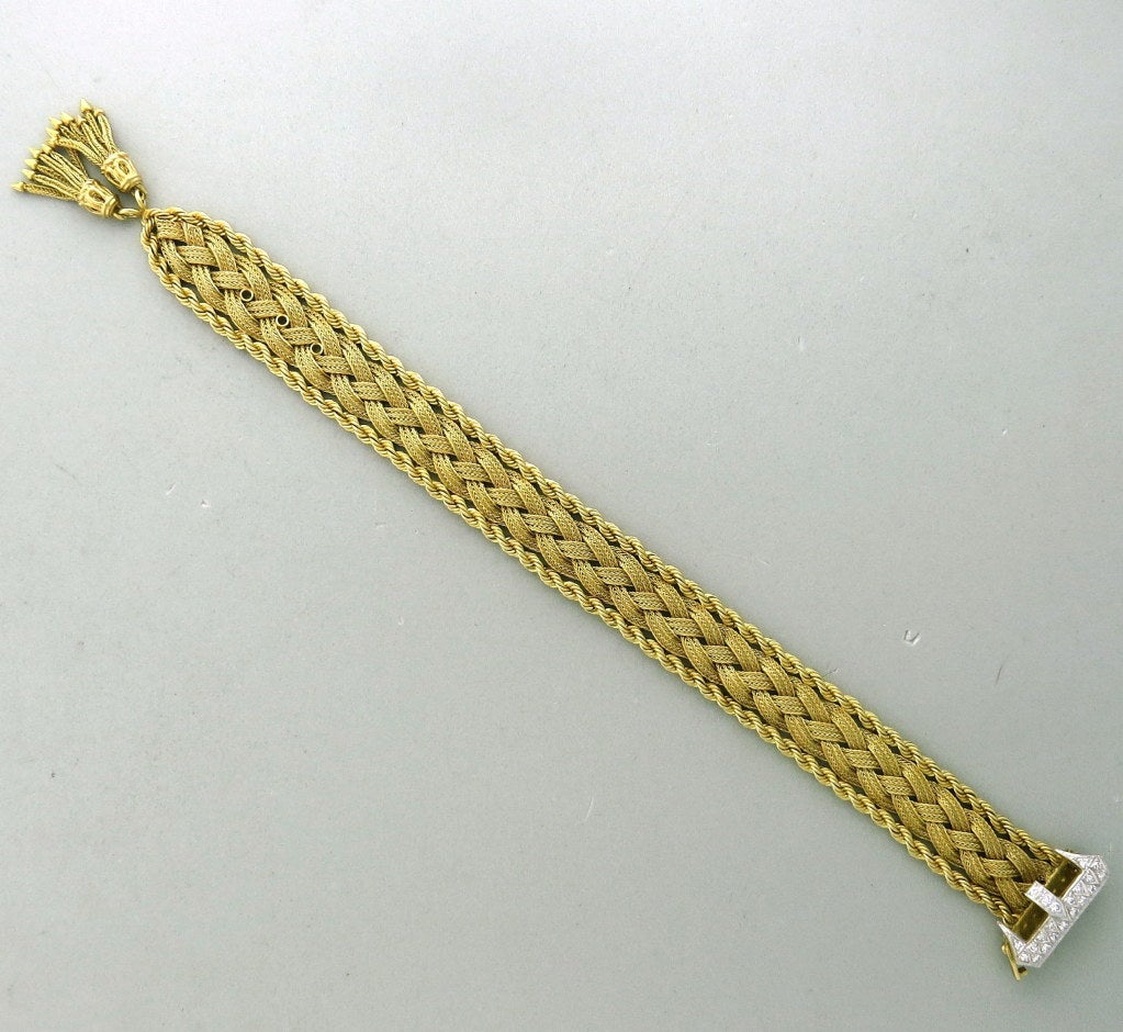 Mid-century 14k gold woven bracelet with approx. 0.45ctw VS/G diamond belt buckle clasp. Length is adjustable up to 7 1/4