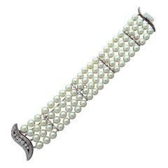 1950s Gold Diamond Pearl Three Strand Bracelet