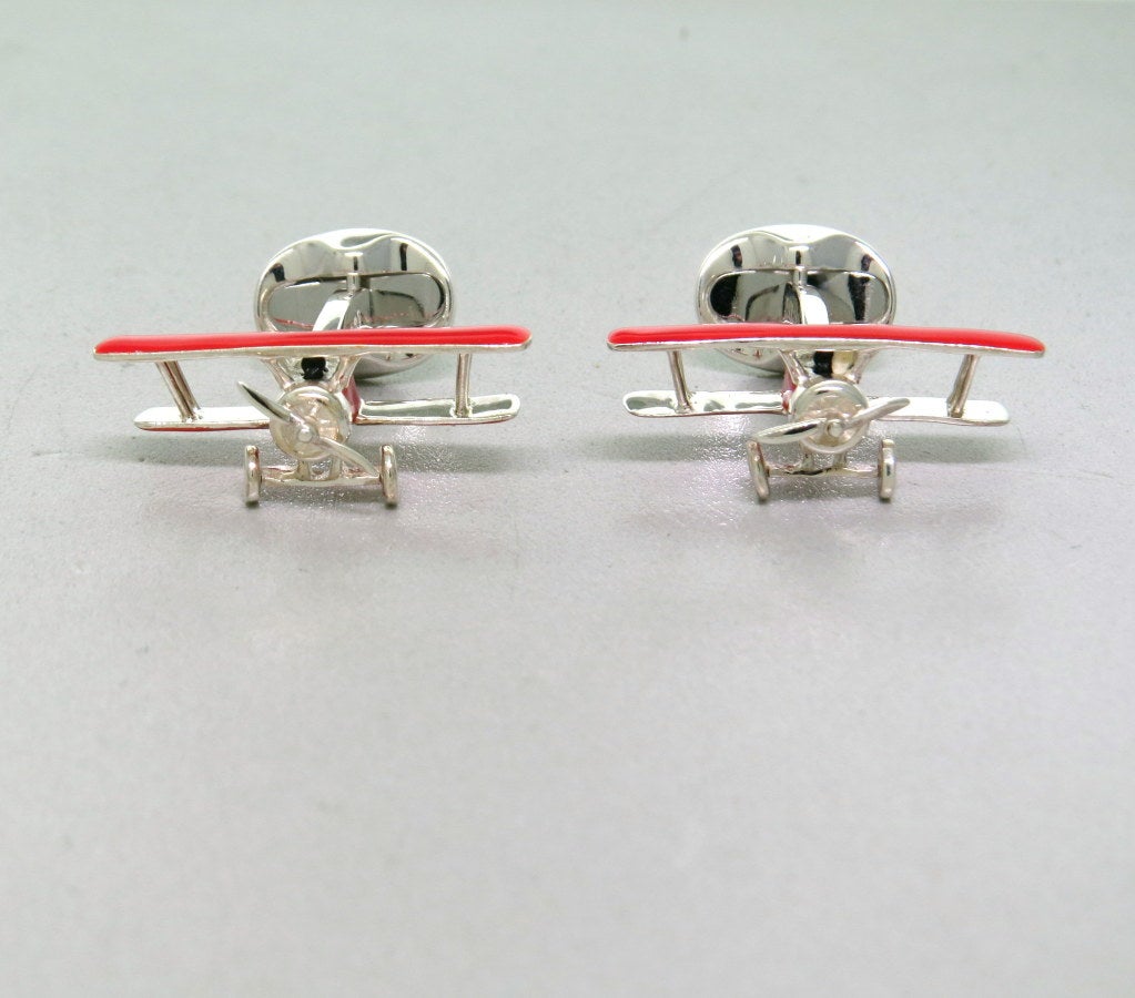 New Deakin & Francis sterling silver red enamel biplane cufflinks,measure - 28mm x 12mm. Come with original box and papers. Marked - Deakin & Francis, D & F,925. weight - 15.2g