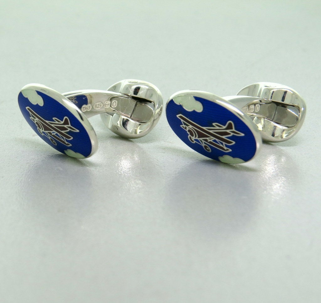 Brand new Deakin & Francis sterling silver oval cufflinks,decorated with blue,and maoon biplane enamel. Cufflink top 19mm x 14mm. Marked D & F,Deakin & Francis,925. weight - 15.6g Come with box and papers