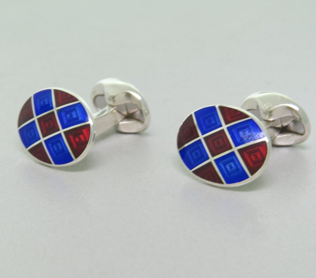 Brand new Deakin & Francis sterling silver oval cufflinks,decorated with royal blue and maroon enamel. Cufflink top is 19mm x 14mm. Marked Deakin & Francis,925,D &F. weight - 16.2g Come with box and papers