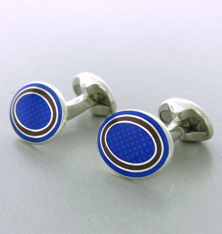 Brand New Deakin & Francis sterling silver oval cufflinks,decorated with royal blue and maroon enamel. Cufflink top 19mm x 14mm. Marked Deakin & Francis,925,D & F. Come with box and papers. weight - 16.1g