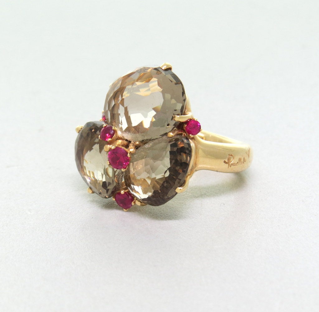 Pomellato 18k rose gold ring with smokey quartz and rubies from Bahia collection.  Ring size - 6 3/4, ring top is 24mm x 23mm. weight - 19.5g