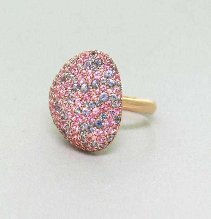 18k rose gold ring with approx. 6.00ctw multi color sapphires. Ring size - 6 1/4, ring top is 26mm x 21mm. weight - 11.9g