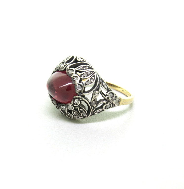 Antique gold ring with rose cut diamonds and 6mm x 10mm garnet. Ring size - 7, ring top is 16mm x 21mm. weight - 5.9g