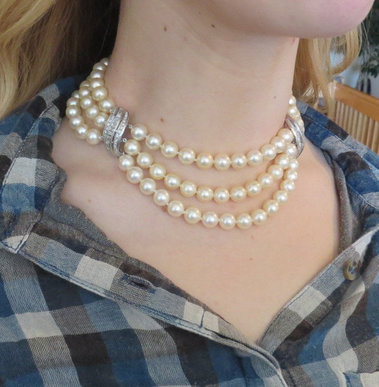 1950s 14k white gold necklace with 8.5mm to 9.5mm pearls and channel set round and baguette diamond sections. Necklace is 14 1/2