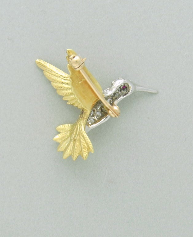 18k yellow gold , platinum,  diamonds ,ruby eye. 28mm X 30mm. Marked 18k. Plat.