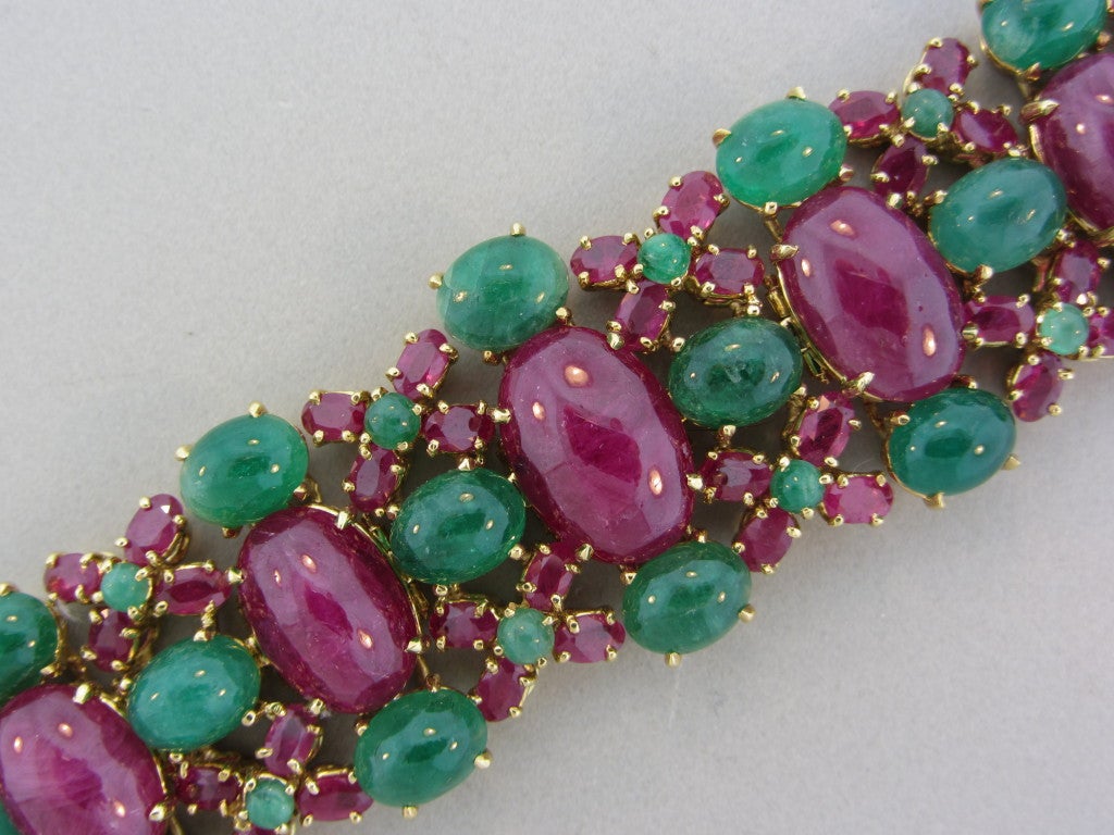 18K yellow gold Marked TONY DUQUETTE, 18K. Gemstones/Diamonds Rubies, Emeralds  Measurements: Bracelet 7.75