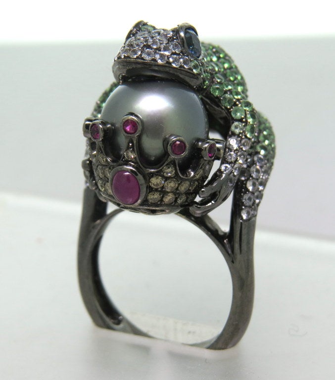 Modern 18k blackened white gold ring with 11.2mm  Tahitian pearl, tsavorites,diamonds,sapphires and rubies. Ring size 6 3/4, ring top is 29mm x 21mm,ring sits approx 20mm from the finger. weight - 16.6g