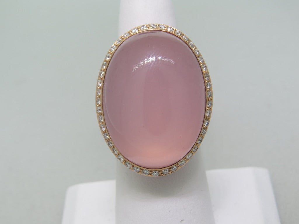 Modern 18k rose gold ring with large 41.78ct pink quartz 27mm x 20mm, 4.61ctw pink sapphires and 0.85ctw diamonds. Ring size 6 1/2, ring top is 31mm x 24mm. Weight - 23.0g.
