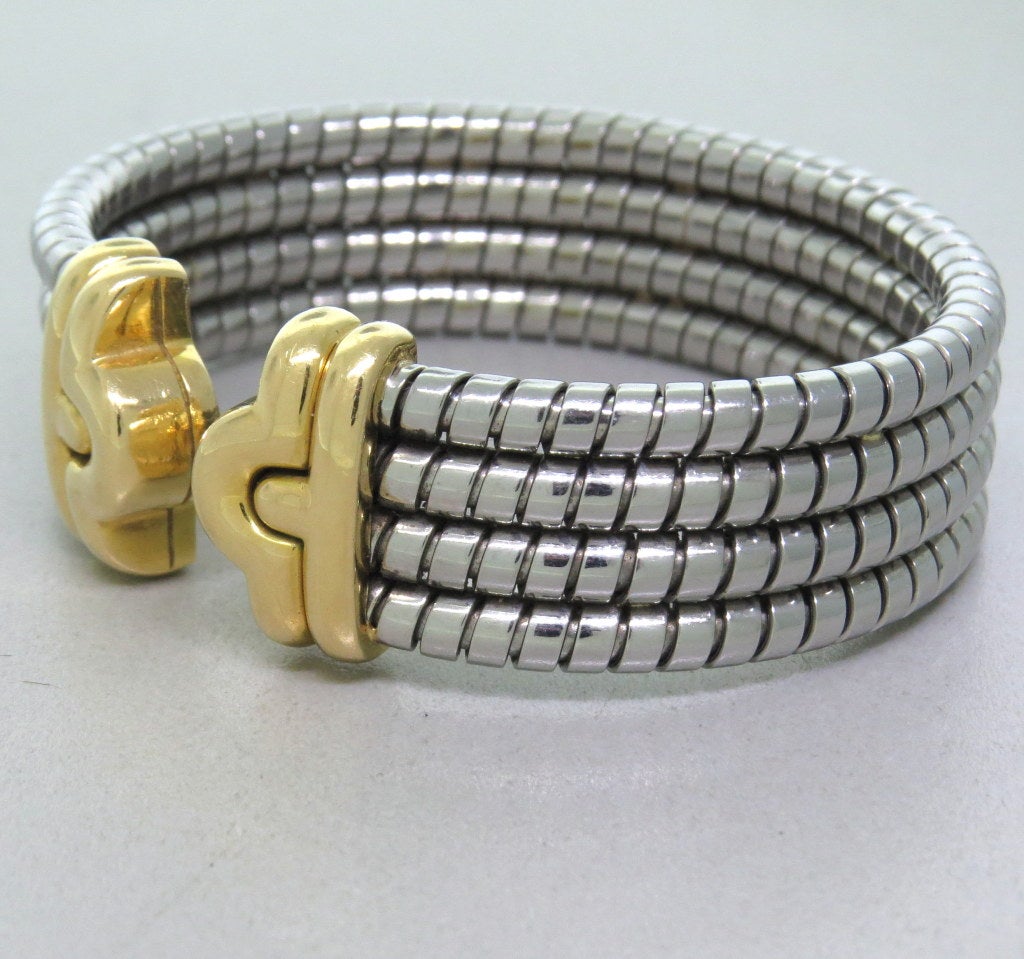 Bulgari 18k gold and stainless steel cuff bracelet. Will fit 6 1/2