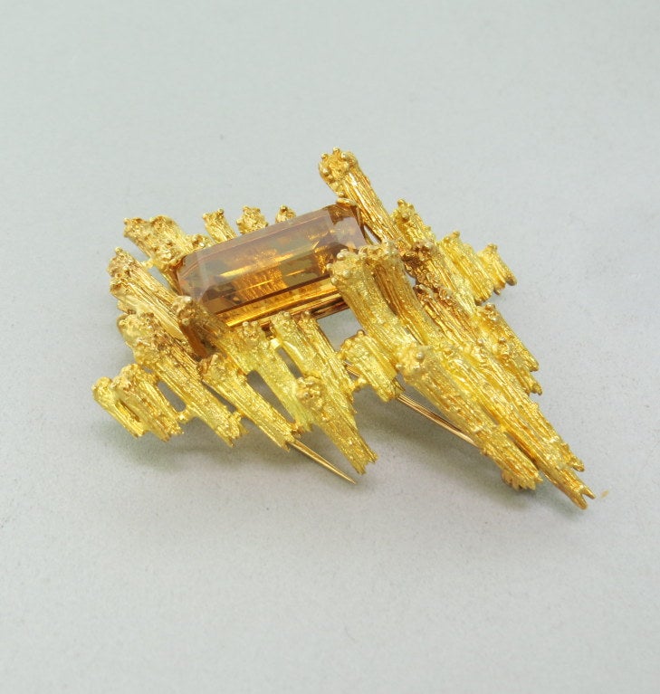 H. Stern 1970s 18k gold brooch with 25-30 carat citrine. Brooch is 64mm x 54mm. Citrine - 21mm x 16.2mm x 10.4mm. Marked with Stern S mark,750. Weight - 39.6g