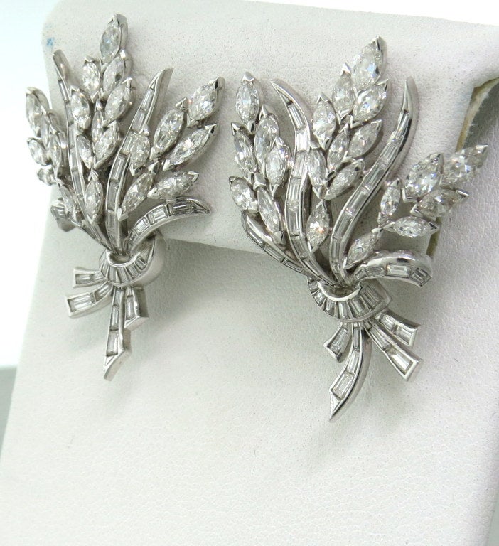 1960s platinum earrings with approximately 3.00 to 3.30 carats marquise and baguette diamonds. Earrings are 38mm x 30mm. Weight - 18.1g